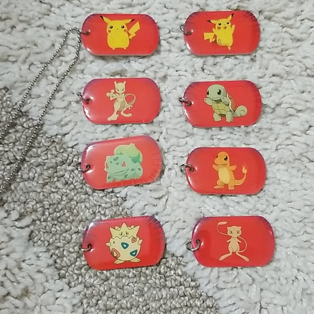 Vintage collection of Pokemon dog tags
